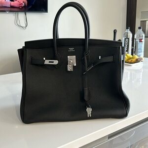 Hundred percent leather brand new black bag